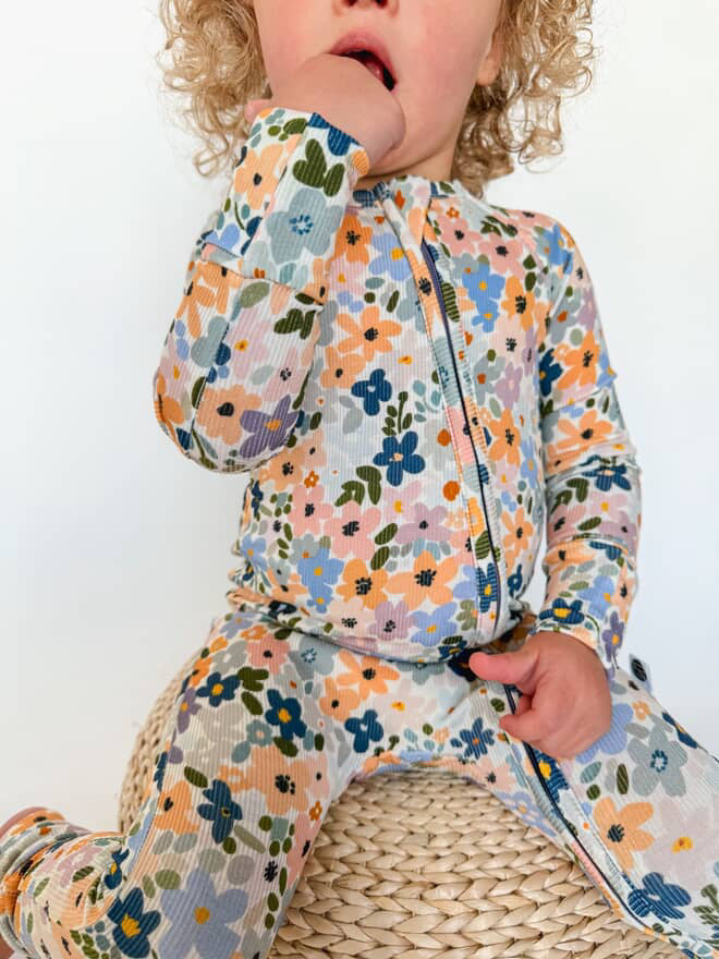FLOWER CHILD | ZIP ROMPER