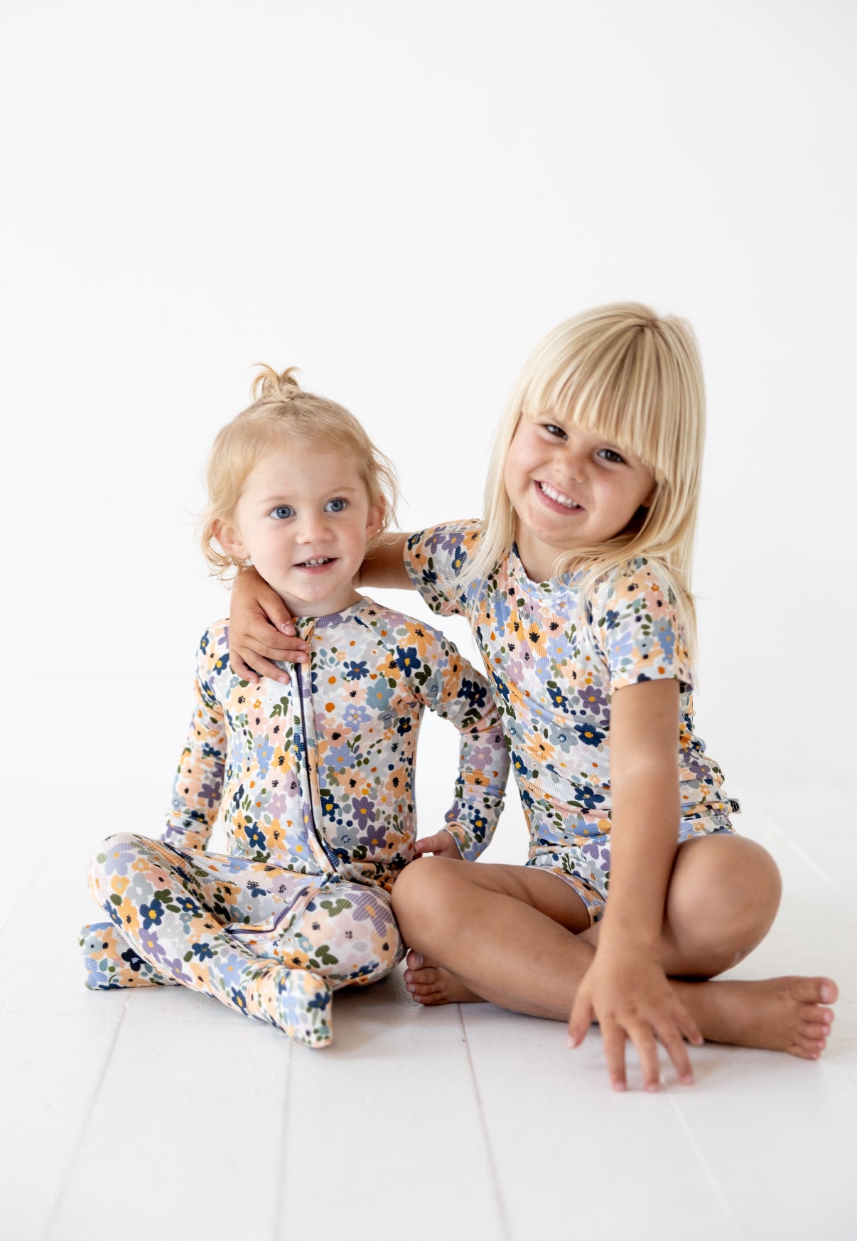 FLOWER CHILD | ZIP ROMPER